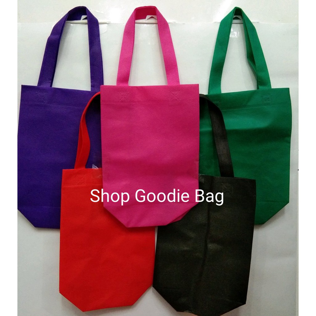 

Unik Tas Spunbond Handle Box uk 20x25x9 - Goodie Bag - Tas Kain Polos Murah