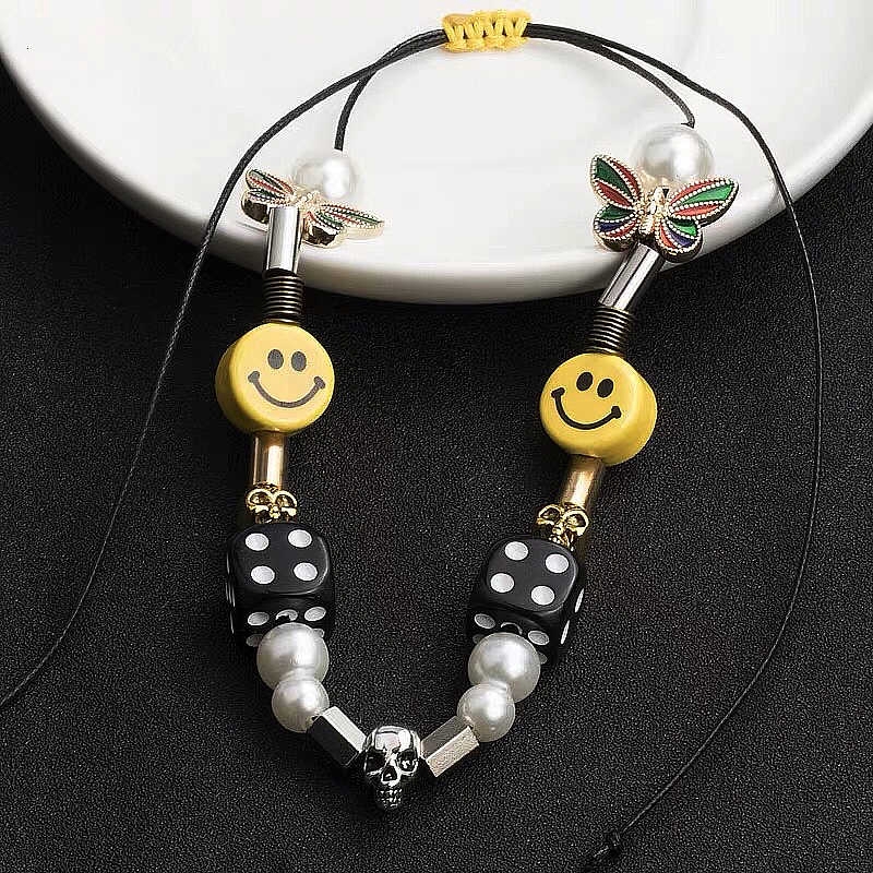 19157Silver Skull Butterfly Ceramic Smiley Necklace，Hip hop trend dice couple bracelet