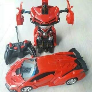 WK MAINAN  MOBIL ROBOT  TRANSFORMER MERAH REMOTE CONTROL THE 