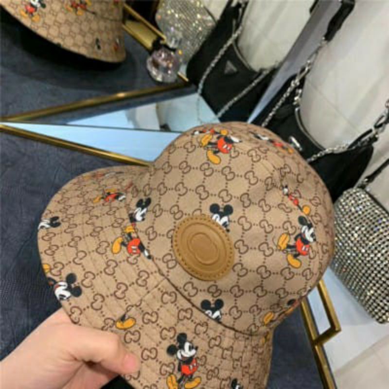 topi bucket gucci x disney