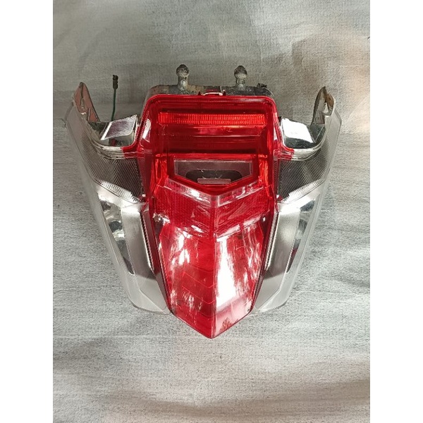 LIGHT UNIT RR COMBINASION LAMPU REM BELAKANG STOPLAMP  HONDA SUPRA X 125 NEW FI 204 ORIGINAL COPOTAN