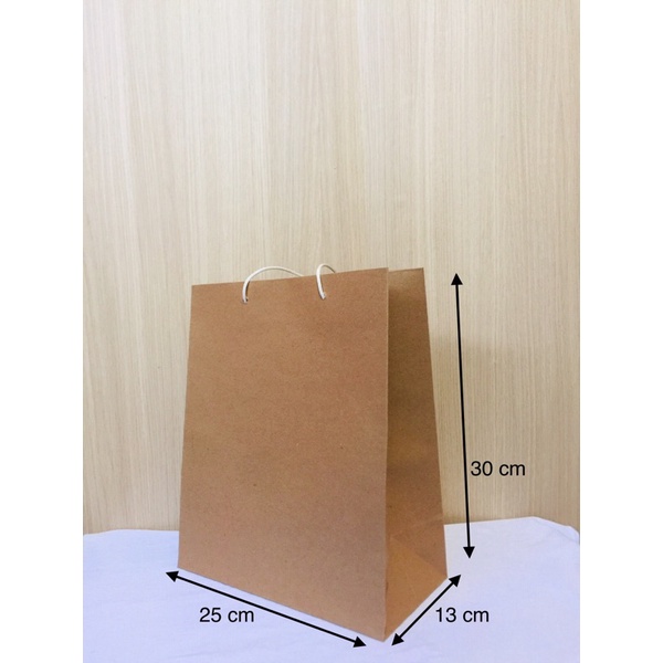 

paper bag polos coklat pigora size 25 x 13 x 30 (PxLxT)