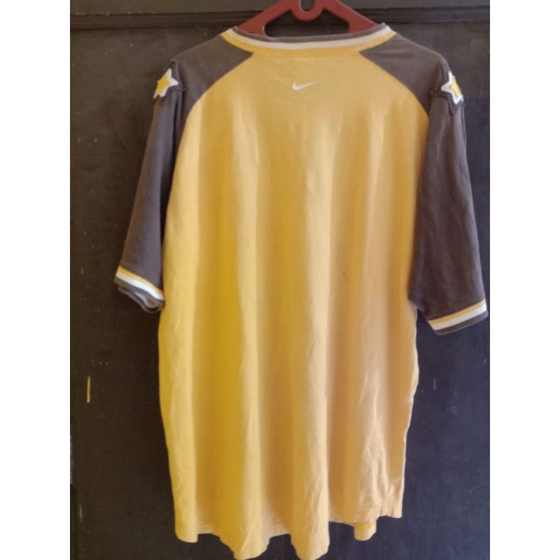 nike kuning coklat