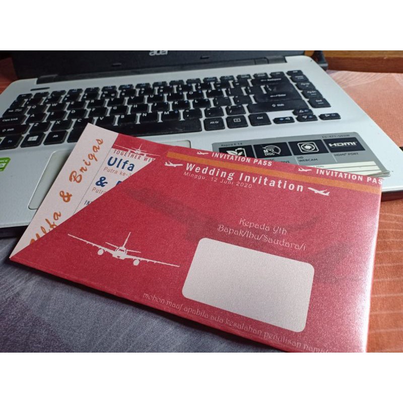 kartu undangan pernikahan tema tiket pesawat 20x20
