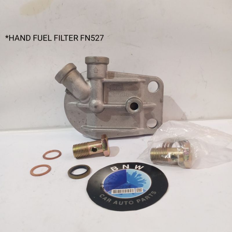 HEAD FUEL FILTER MITSUBISHI FUSO FN 527 BERGARANSI