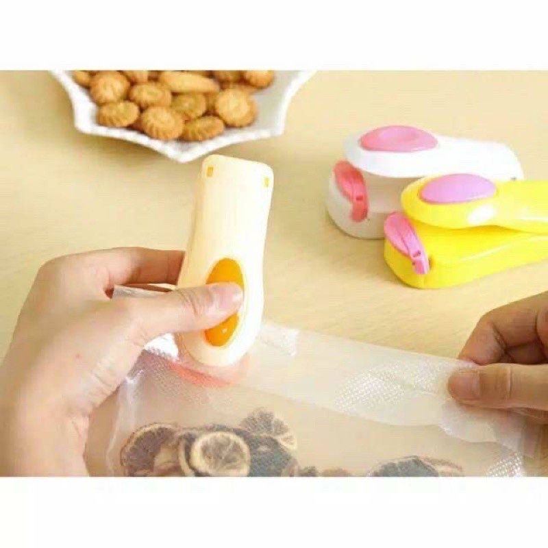 Alat Perekat Kemasan Elektrik Portable / Pembungkus makanan Plastik / Hand Sealer Mini high Quality