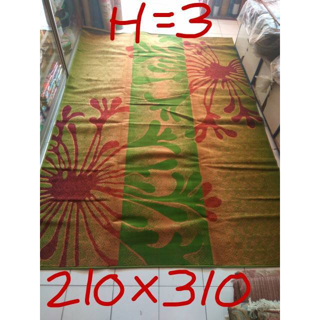 Karpet permadani motif abstrak