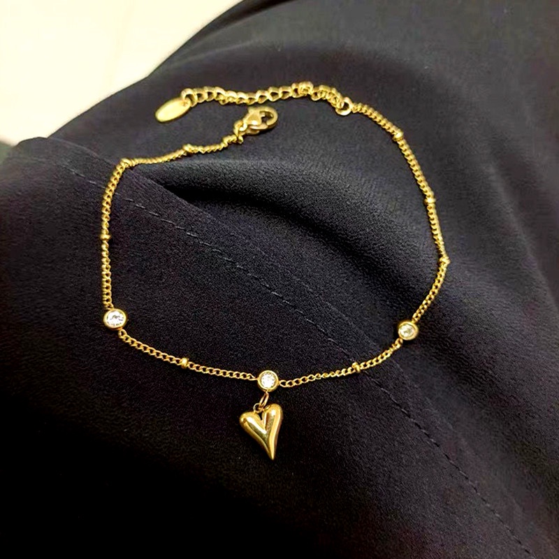 Gelang Kaki Titanium Anti Karat Liontin Hati Berlian Lapis Emas 18k Aksesoris Wanita