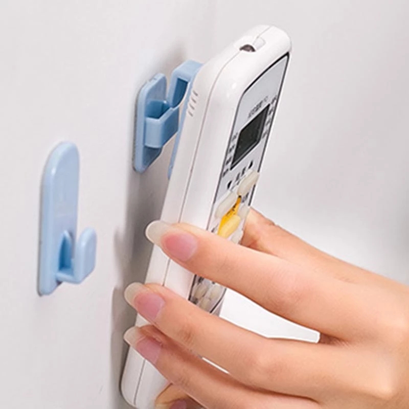 4pcs / set Kait Gantungan Dinding Bahan Plastik Dengan Perekat Kuat Untuk Penyimpanan Remote Control TV Ac