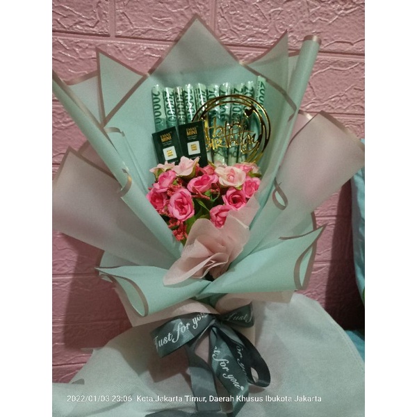 Bucket Logam Mulia dan Uang pecahan 20000