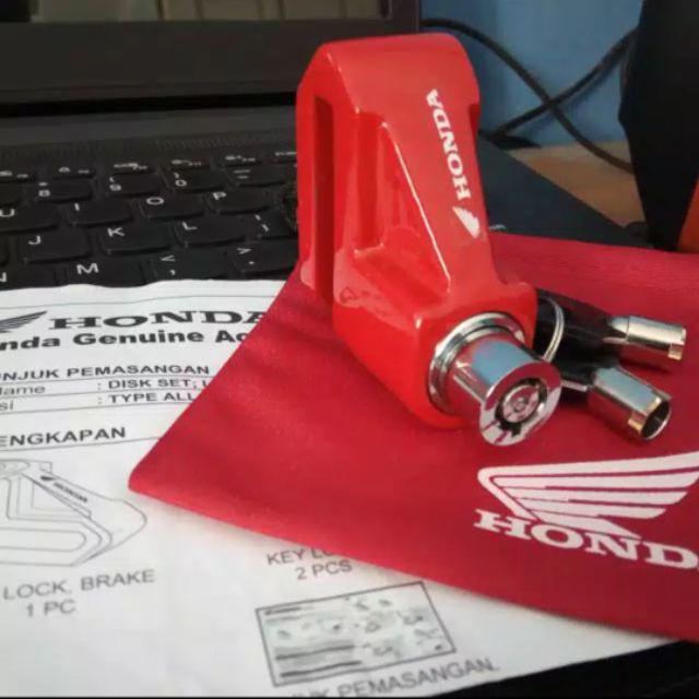 GEMBOK CAKRAM MOTOR ORIGINAL HONDA AHM 100%.-Merah