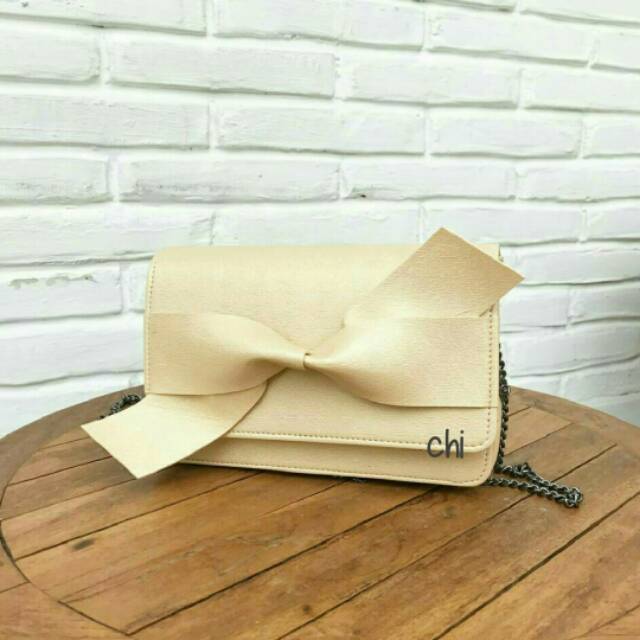

Sling bag pita besar