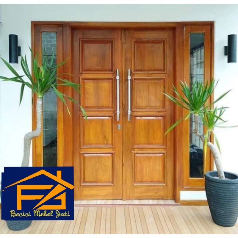 Pintu utama model kupu kupu bahan kayu jati