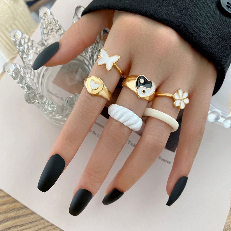 4 / 5 / 6Pcs / Set Cincin Bahan Metal Warna Pink Gaya Punk Untuk Wanita