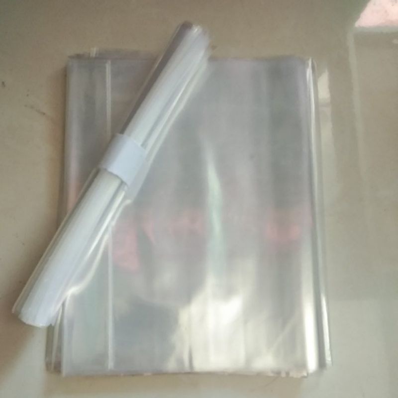 

Sampul plastik buku tulis isi 10pcs