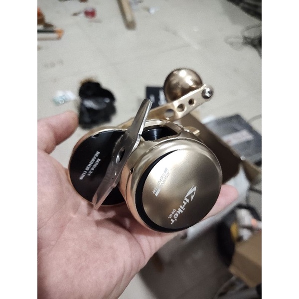 reel pancing jigging monster striker 200 h left overhead