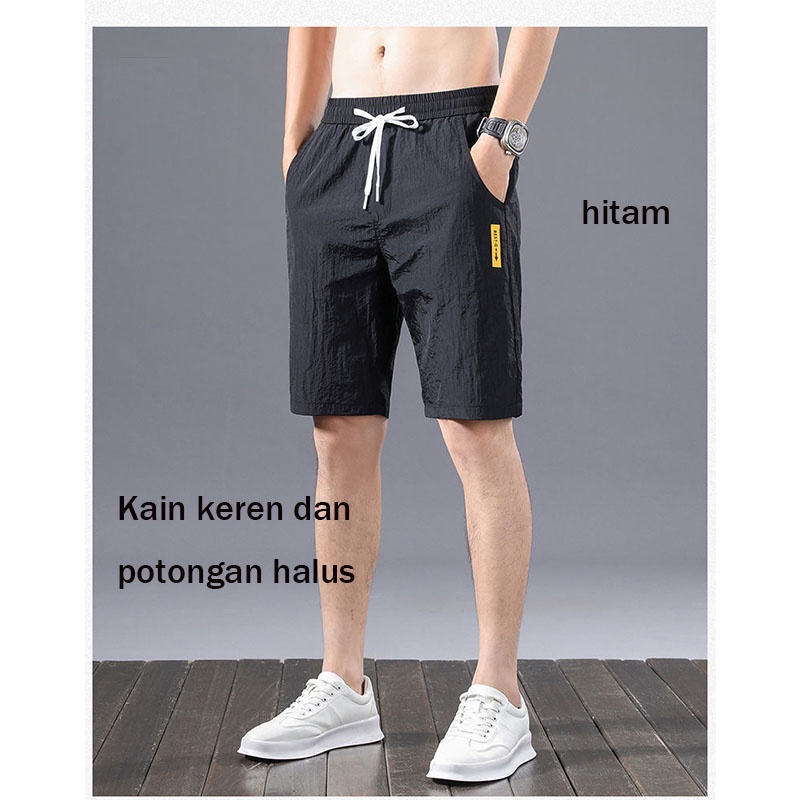 Celana Kasual Pria celana linen  Panas  Tren Bundel Kaki Longgar Olahraga celana korean style pria Es Sutra Pria Baru Bagian Tipis Cepat Kering Celana Sembilan Titik ankle pants pria