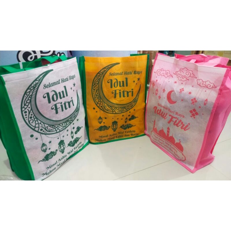 

1 lusin Tas Parcel sablon untuk bingkisan lebaran muat sembako bahan spunbond tebal terlaris