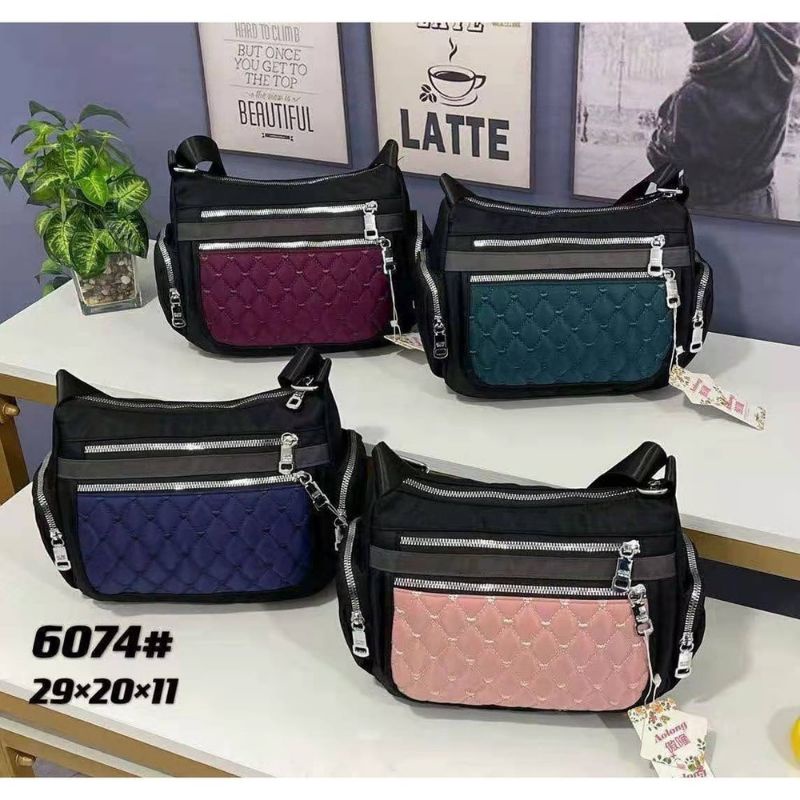 Ready... Tas Slempang Wanita Motif Embos Tas Import bahan Parasut