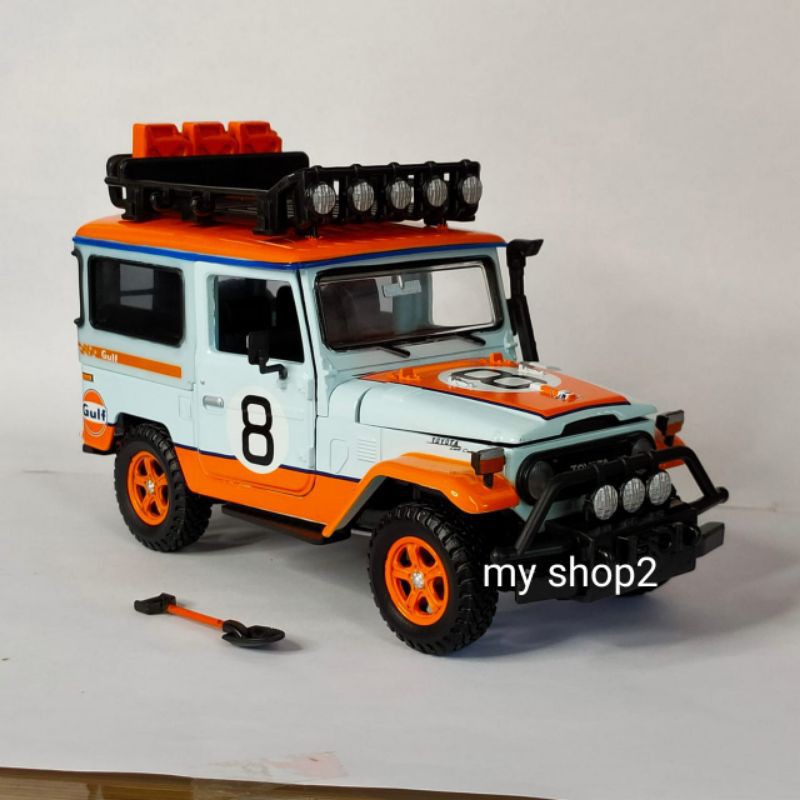 Motormax Skala 1:24 Toyota Land Cruiser FJ40 Tipe Gulf Racing