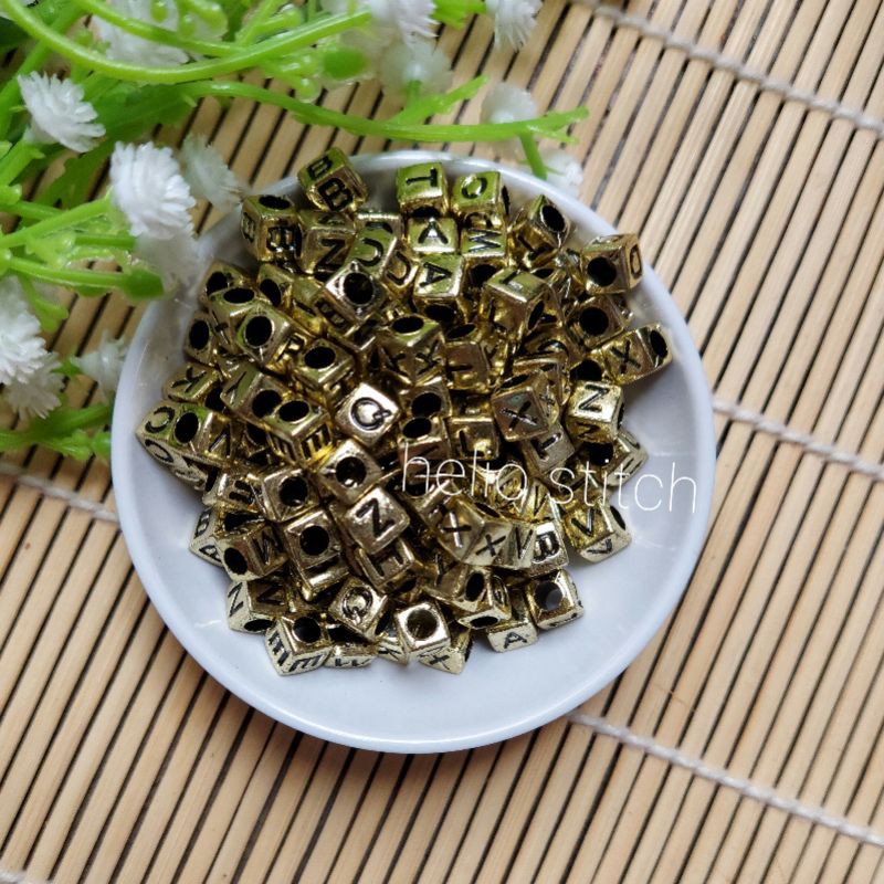 [RANDOM] 15 gram Manik Huruf KUBUS GOLD 6 x 6 mm