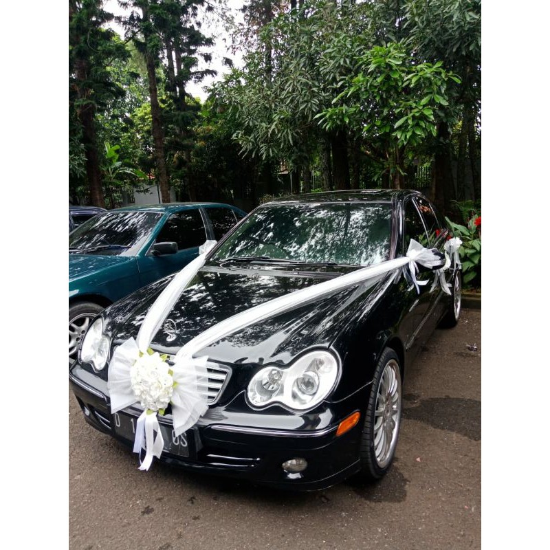 dekorasi bunga hiasan mobil pengantin