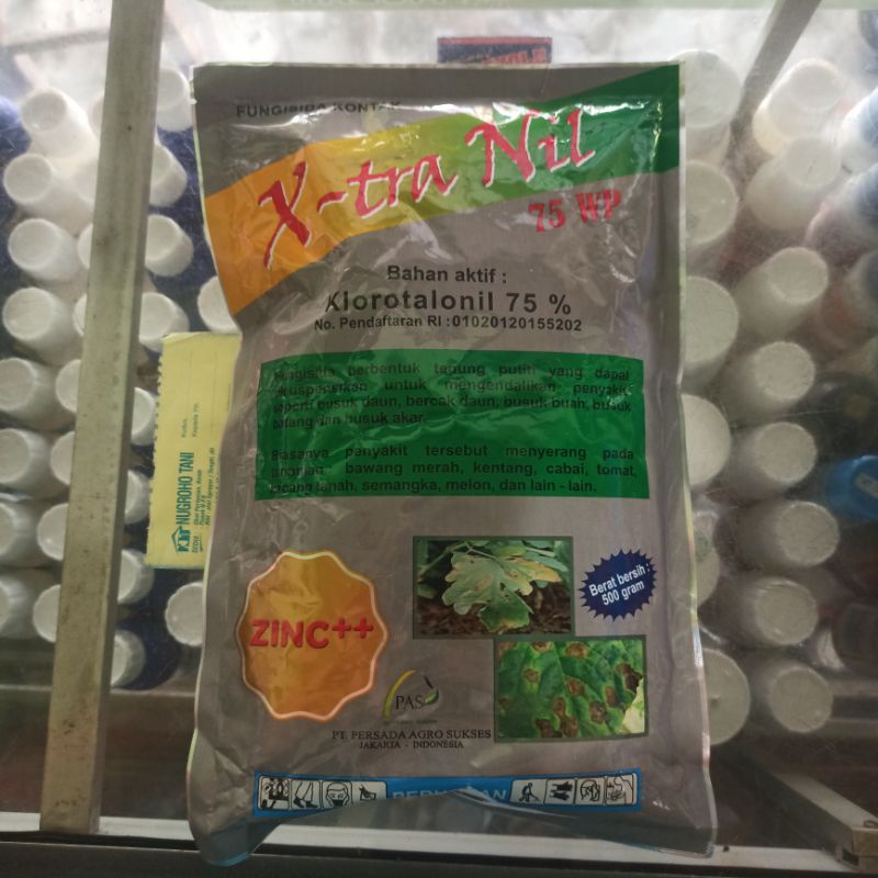 FUNGISIDA X-TRA NIL 75 WP 500 GRAM KLOROTALONIL 75% ZINK++ PENGENDALI BUSUK BUAH DAUN BATANG AKAR