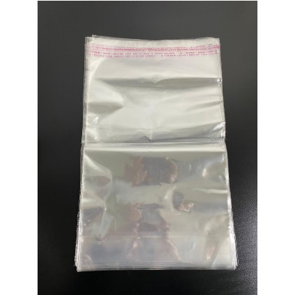 ( Pak 50 Lembar ) PLASTIC MICA GLUE BOOK COVER - SAMPUL BUKU TULIS BENING TRANSPARANT KACA PLASTIK LEM - O.P.P KWARTO A5 ZIBIZ