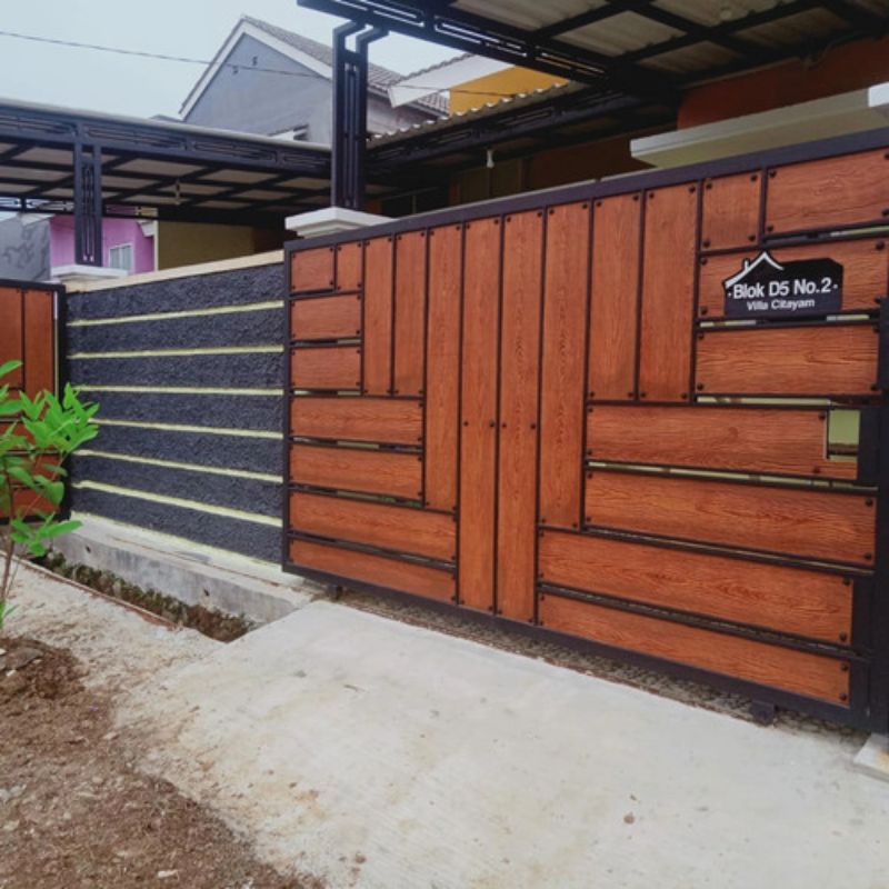 pintu pagar besi motif kayu