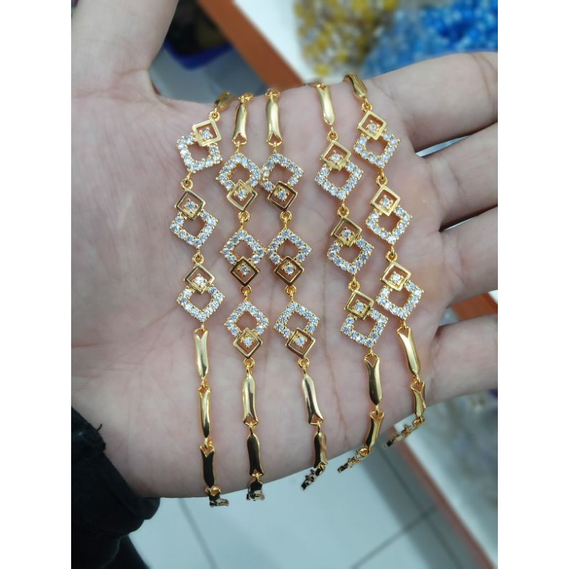 P2-9300.gelang tangan wanita xuping berlapis emas dengan mata zircon uk18cm.