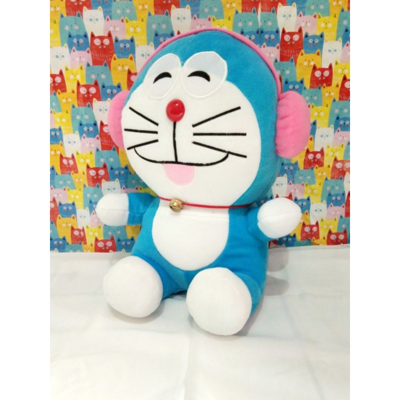 Boneka Doraemon Terbaru Lucu dan Imut pake Headshet Pink