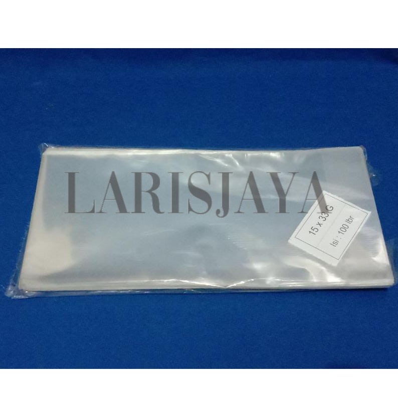 PLASTIK DUDUK OPP POLOS UKURAN 15 x 33  / PLASTIK JAJAN LEBARAN ( ISI 100 PCS )