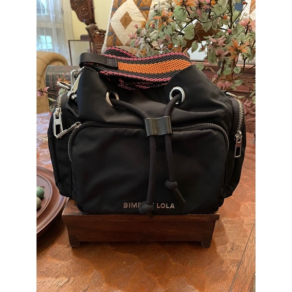 BIMBA Y LOLA BUCKET BAG WITH ORANGE STRAP