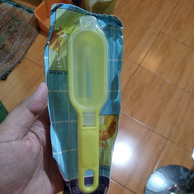 Pembersih Sisik Ikan