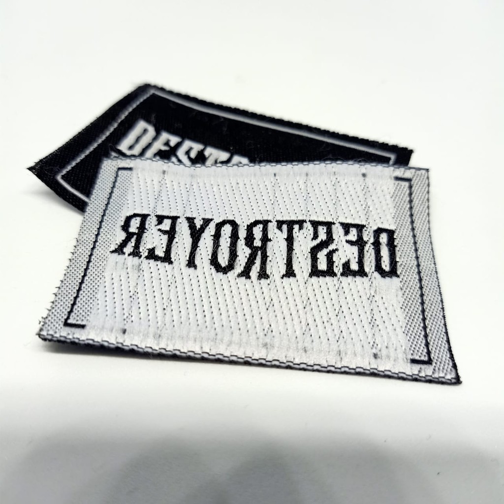label woven baju