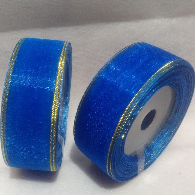 

Pita Organdi Lis Biru BCA Ukuran 1 inch/ 2,5cm Per Roll