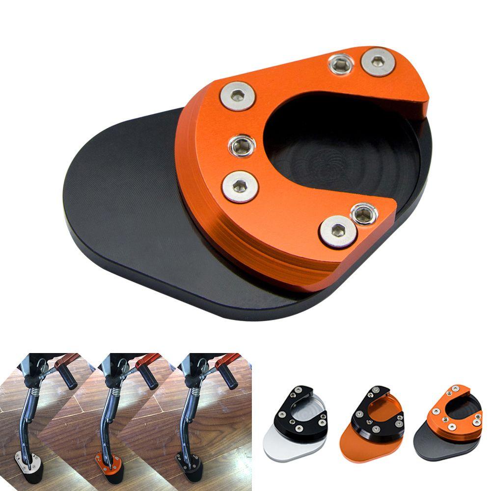 Populer Kaki Ekstensi Pad Pembesar Suku Cadang Motor Kickstand Kaki Penopang Side Kick Stand Untuk Voor KTM 125duke 2012-2018