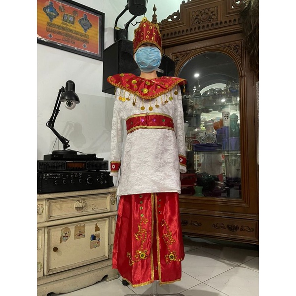 baju adat anak maluku cewe
