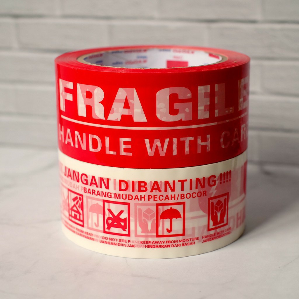 LAKBAN FRAGILE 48 MM 80 YARD - ISOLASI FRAGILE JANGAN DIBANTING ONLINE SHOP MERAH PUTIH SEGEL
