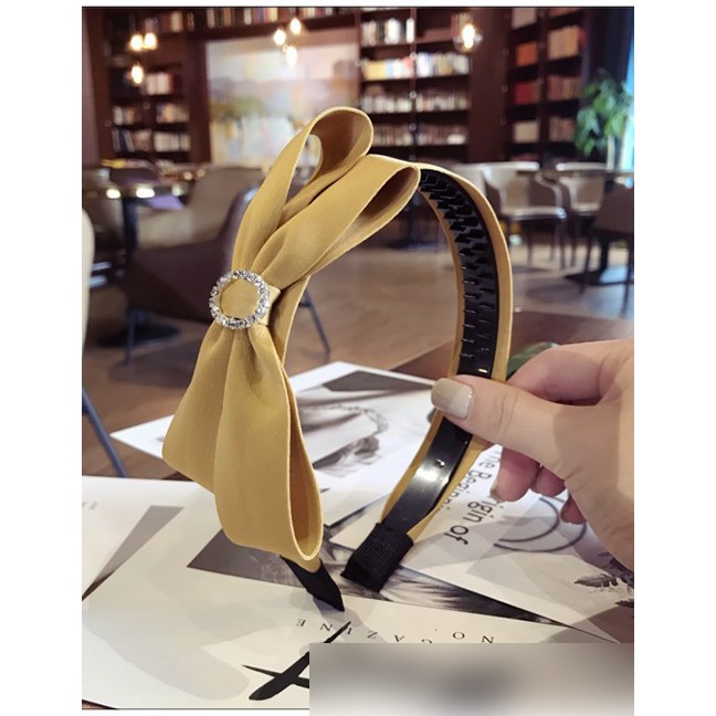 LRC Bando Elegant Bowknot Decorated Pure Color Hair Hoop F21507