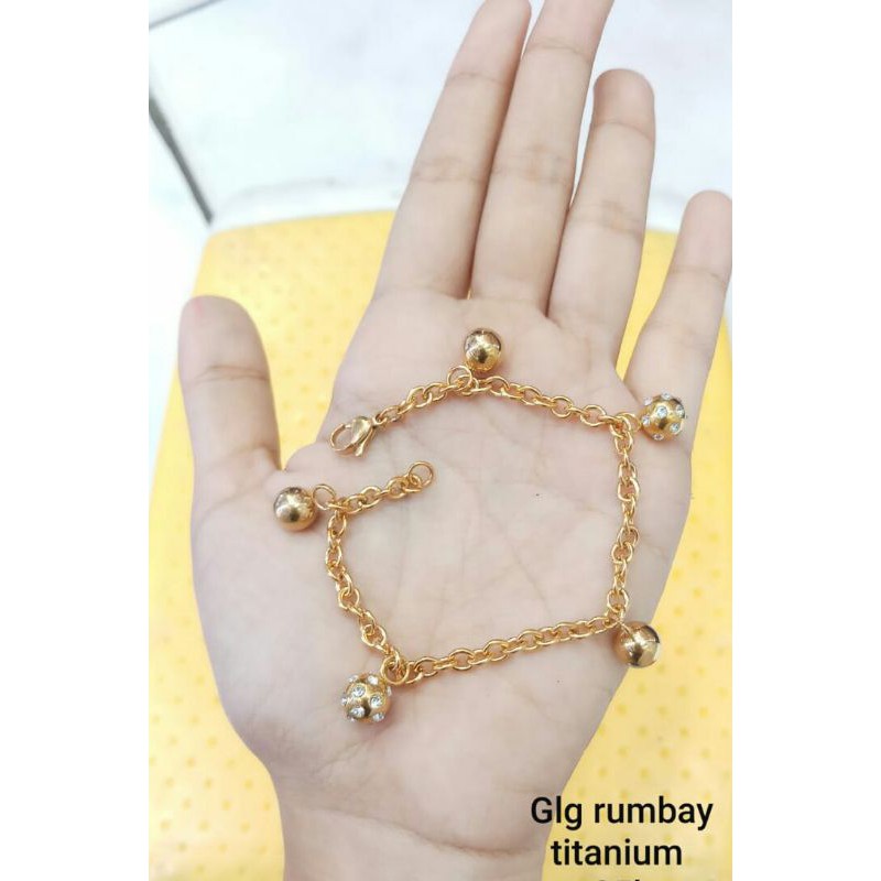 GELANG TANGAN TITANIUM MOTIF RUMBAY BOLA BOLA WARNA EMAS