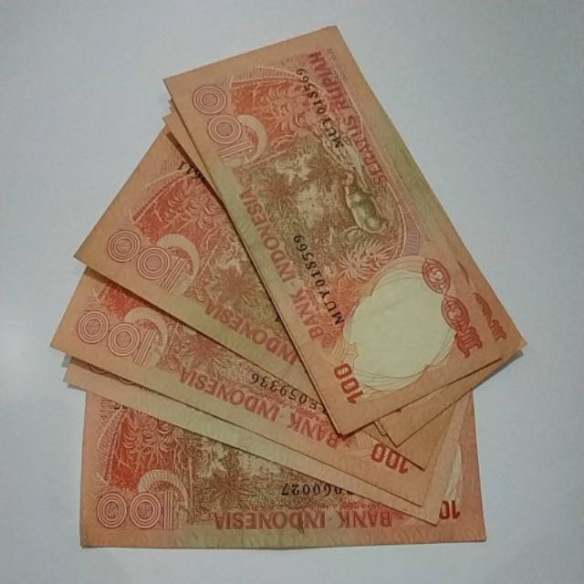 (GRESS/AU/UNC) Uang kuno 100 rupiah badak tahun 1977