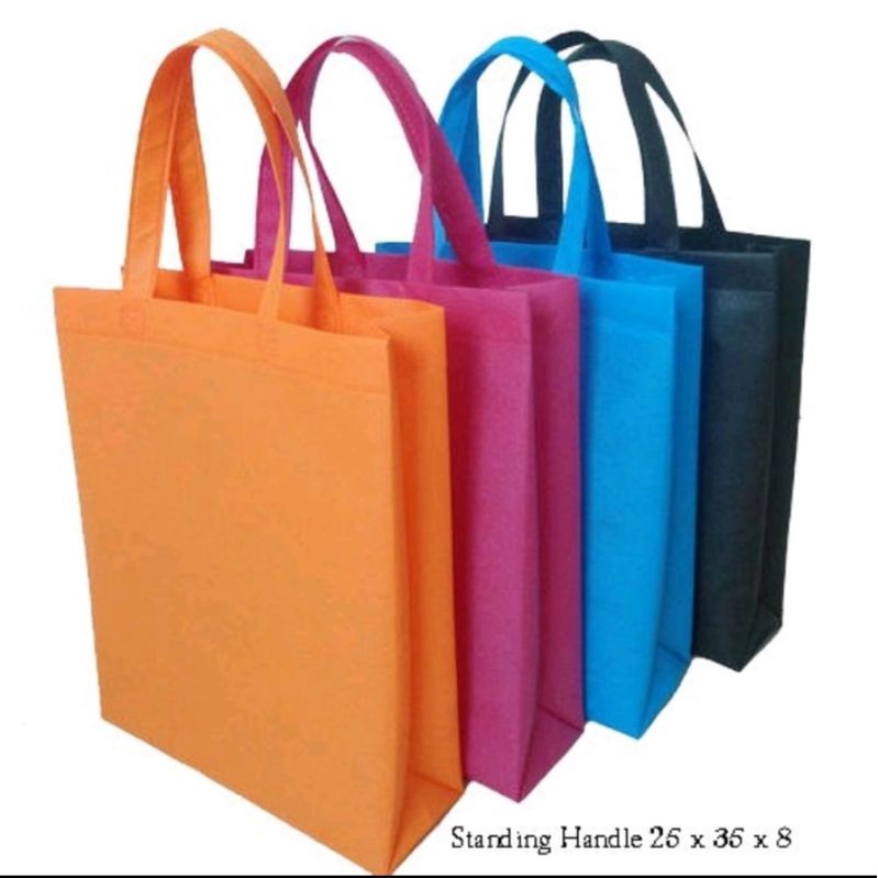 

Isi 12pcs Tas Spunbond Handle Panjang / Goodie Bag / Tas Kain Polos
