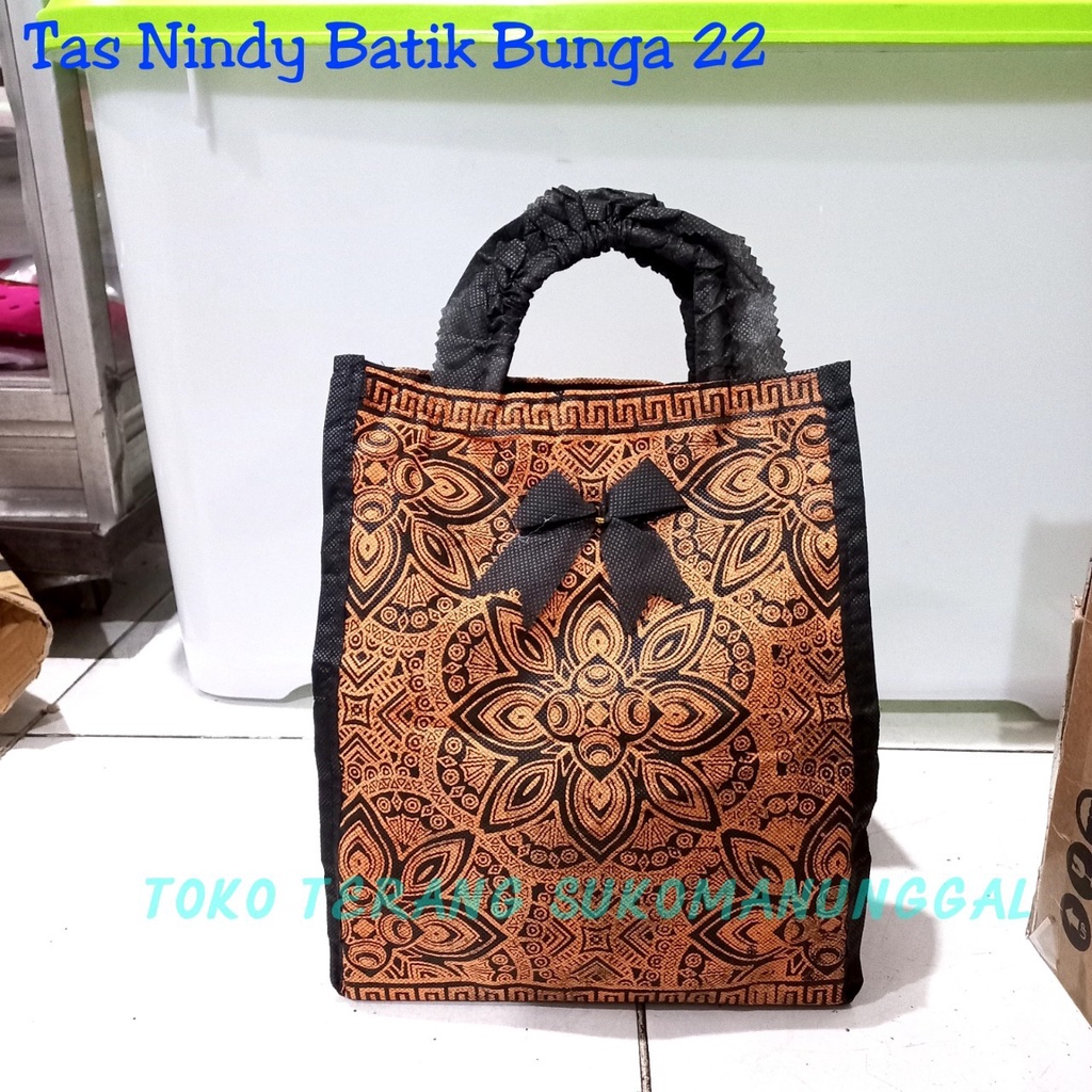 

tas hajatan spunbond nindy batik bunga 22 lusinan