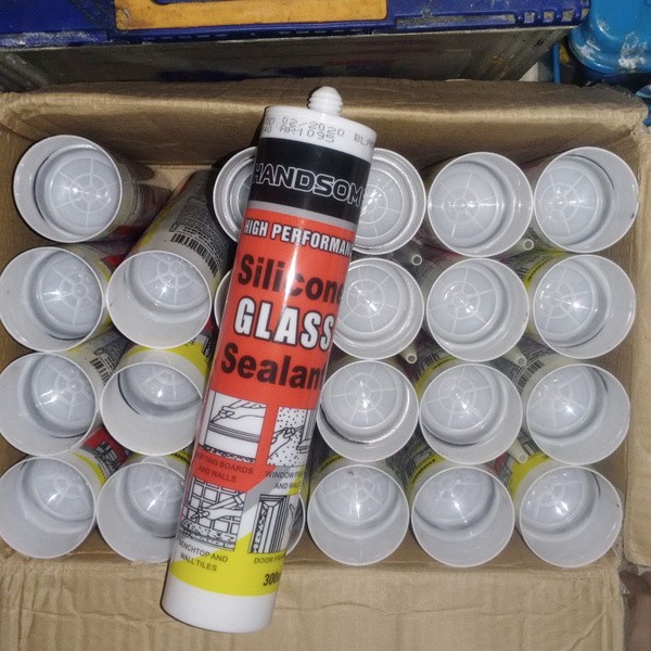 

HANDSOM LEM Silicone / Sealent / Warna Hitam-Putih-Bening