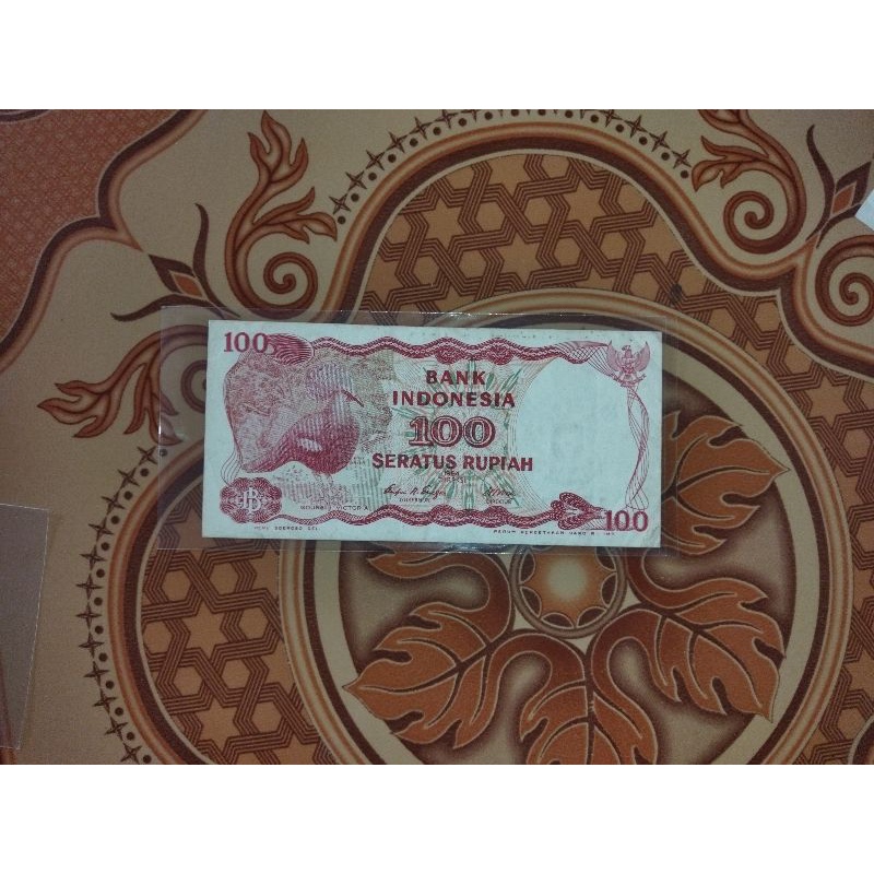 UANG KERTAS KUNO 100 RUPIAH BURUNG GOURA VICTORIA 1984