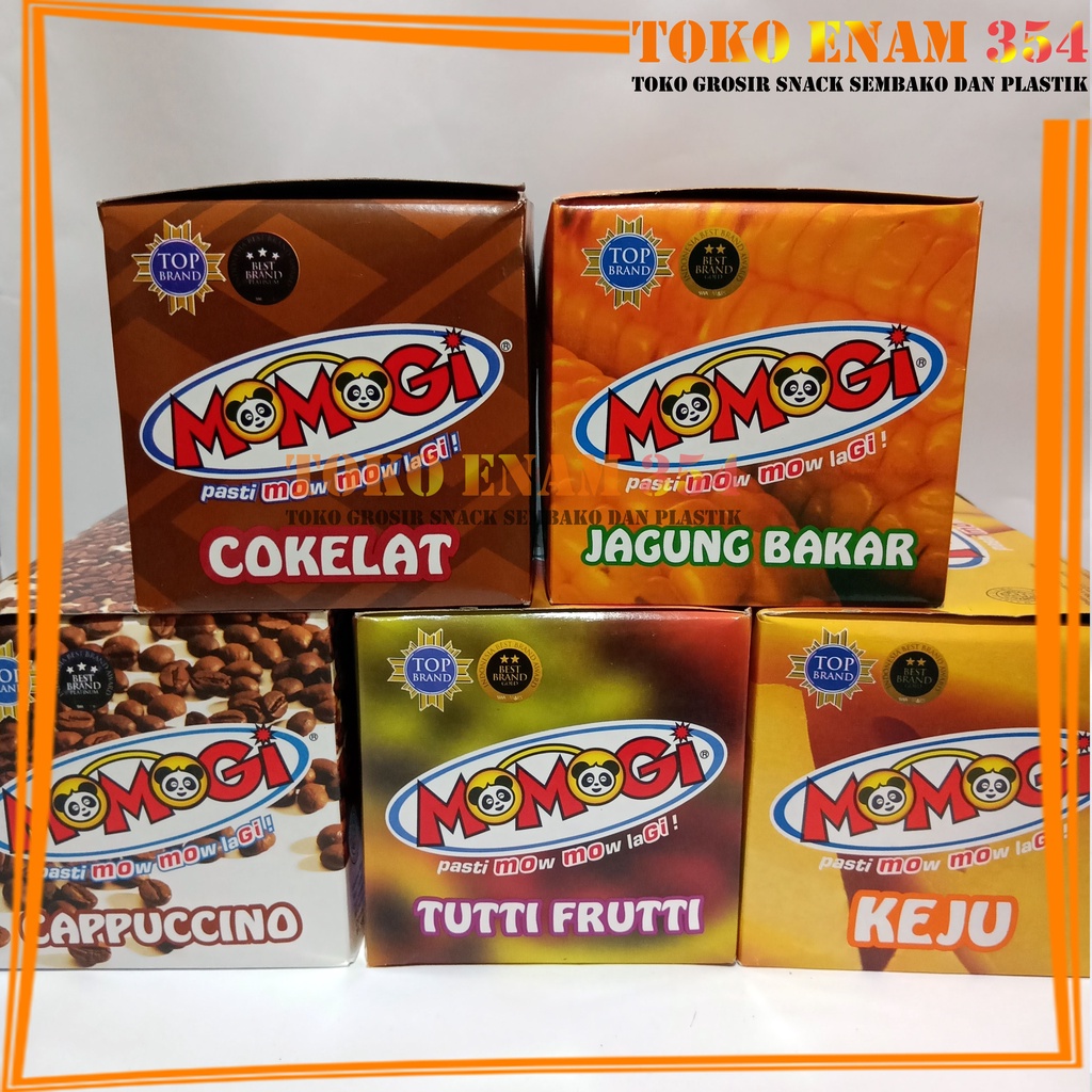 

Momogi Stick Snack Rasa Coklat / Cappucino / Keju / Jagung Bakar / Tutti Frutti 1 Box Isi 6 Gr x 20 Pcs