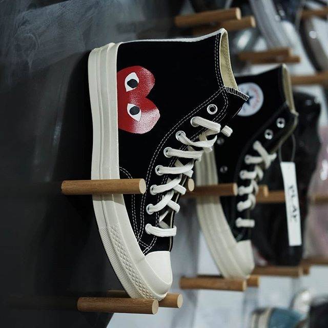 black converse with red heart