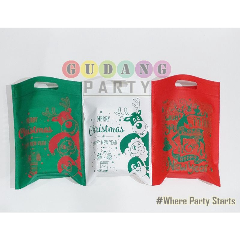 

Spunbond Lubang Natal/Kantong Natal/Goody Bag Natal/Tas Bingkisan Natal