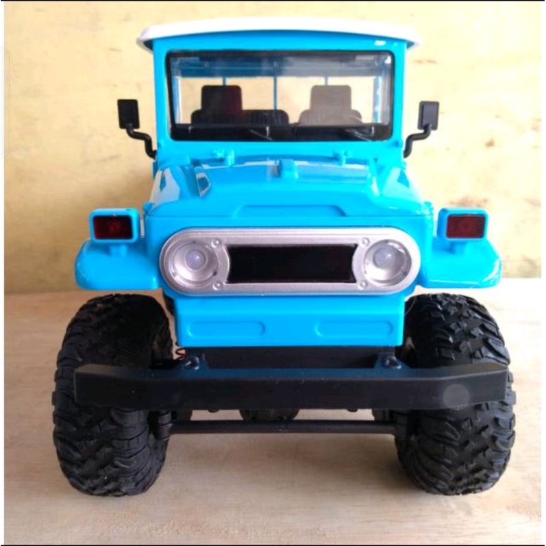 Mainan rc toyota land cruiser fj45 biru semi propo skala 12 RtR